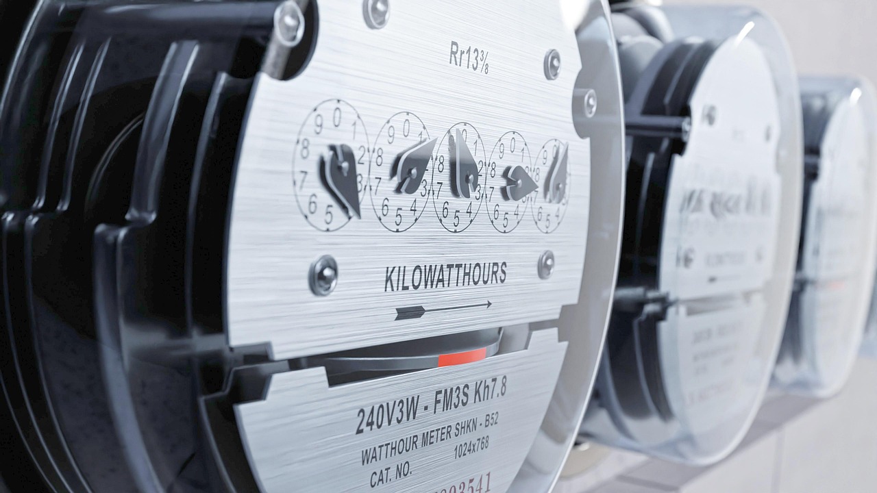 Close-up of electricity meters showing detailed readings for MHHS data collection.